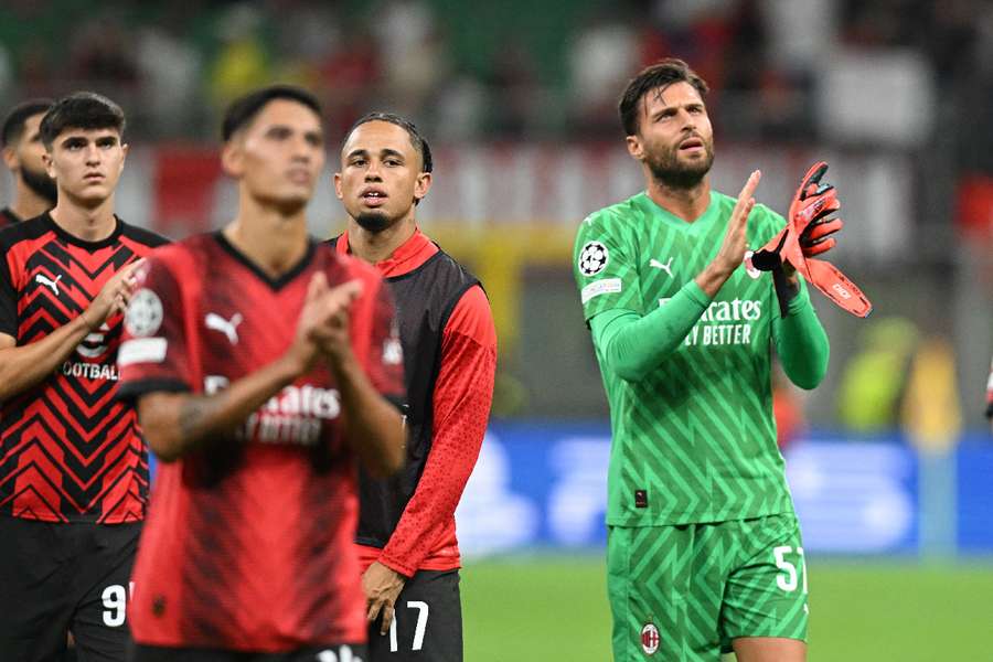 AC Milan's Marco Sportiello applauds fans 