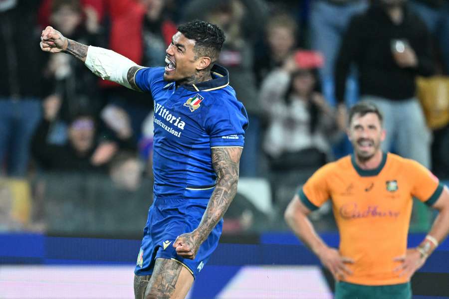 Italy's Monty Ioane celebrates what turns out to be the match-winning try in Udine.