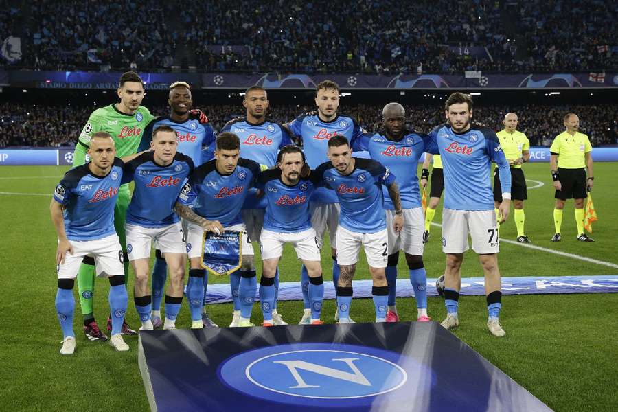 Napoli players pose for a team group photo before a Champions League match