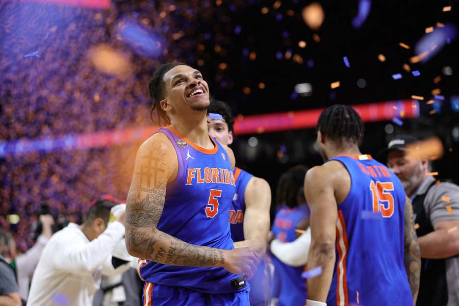 Florida players celebrate after defeating Houston to win the NCAA Men's Basketball Championship