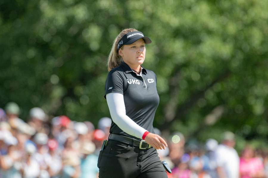 Brooke Henderson from Canada walks on the 18th hole green during the final round of the CP Women's Open golf tournament