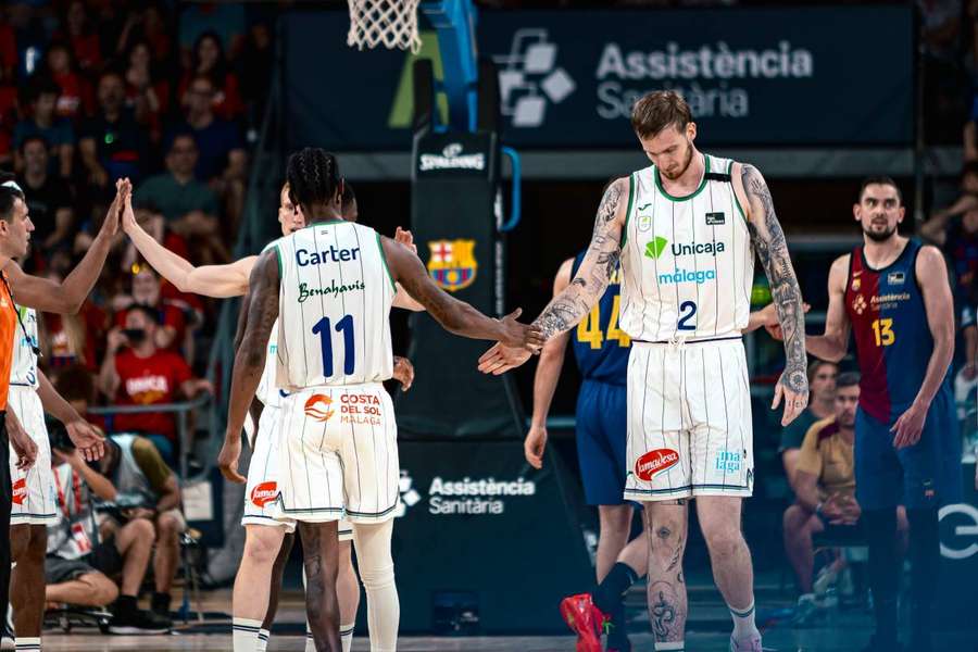 El Unicaja celebrando una canasta