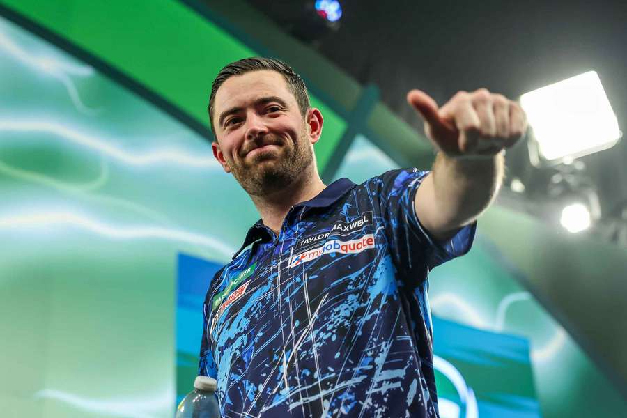 Luke Humphries reacts during his PDC World Darts Championship match against Ted Evetts Luke Humphries reacts during his PDC World Darts Championship match against Ted Evetts