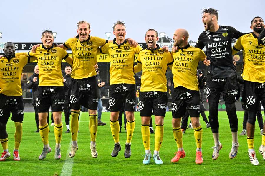 Mjallby players celebrate their victory over Elfsborg