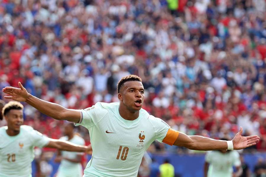 France's Kylian Mbappe celebrates scoring against Morocco