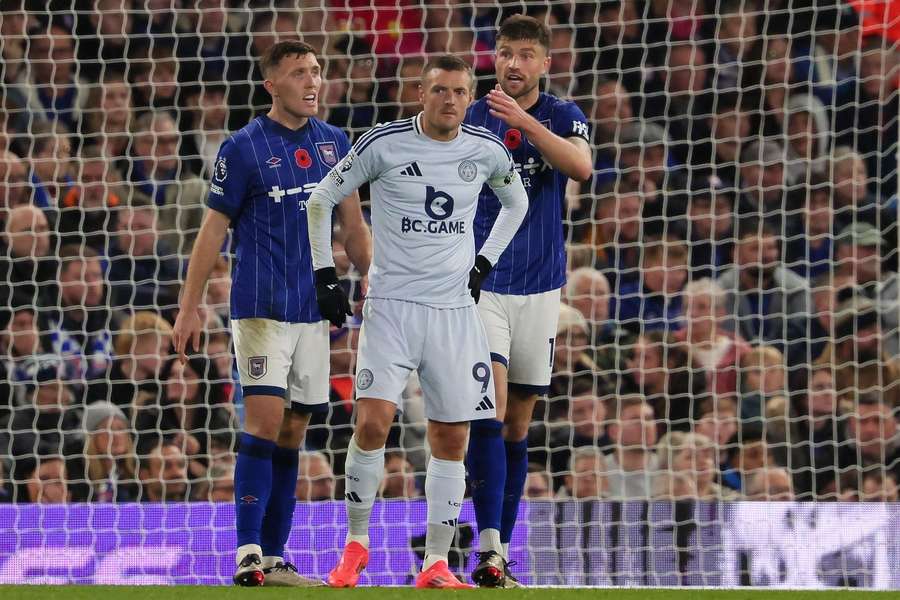 Leicester's Jamie Vardy is marked by Ipswich Town's Dara O'Shea and Cameron Burgess in their first meeting of the 2024/25 season. Leicester's Jamie Vardy is marked by Ipswich Town's Dara O'Shea and Cameron Burgess in their first meeting of the 2024/25 season.