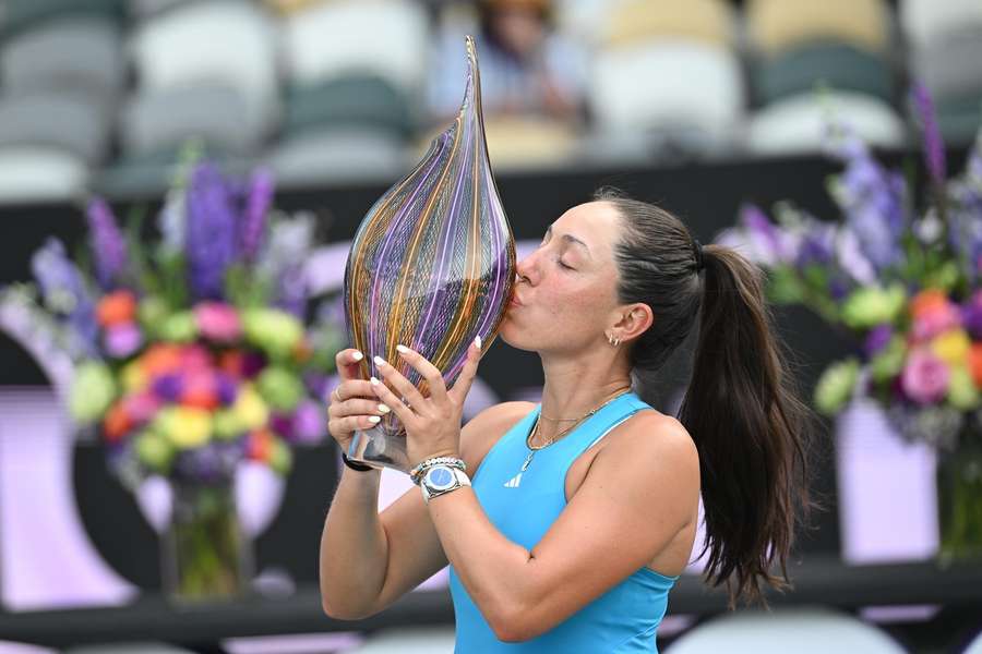 Jessica Pegula celebrates with her trophy