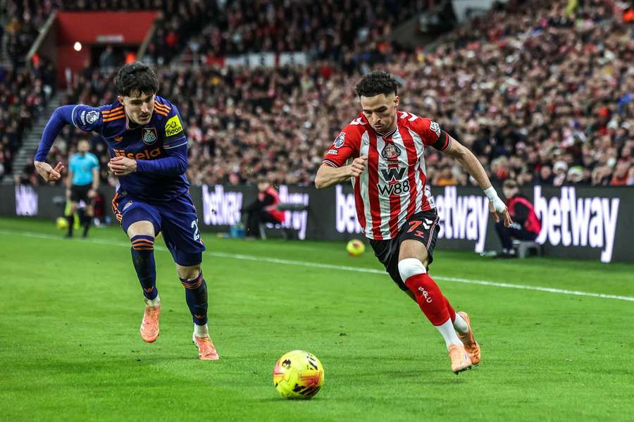 Sunderland's Chemsdine Talbi under pressure from Newcastle's Tino Livramento