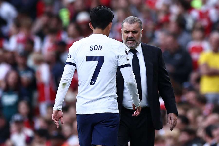 Tottenham Hotspur's South Korean striker #07 Son Heung-Min leaves the game, substituted by Tottenham Hotspur's Greek-Australian Head Coach Ange Postecoglou