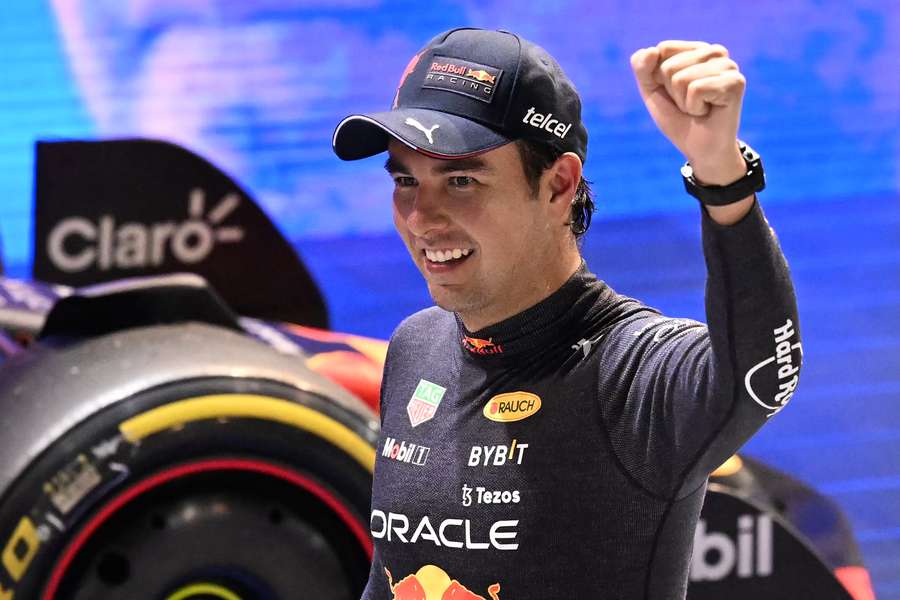 Red Bull Racing's Mexican driver Sergio Perez celebrates after the Formula One Singapore Grand Prix
