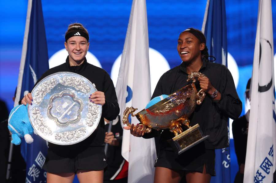 Gauff (R) and Muchova with their trophies