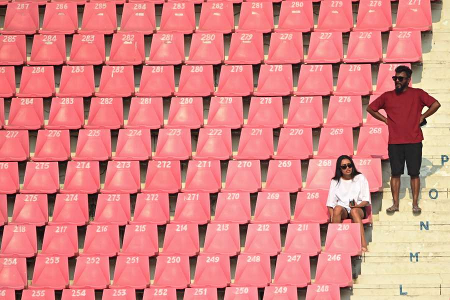 Spectators watch the World Cup match between Australia and Sri Lanka at the Ekana Cricket Stadium in Lucknow