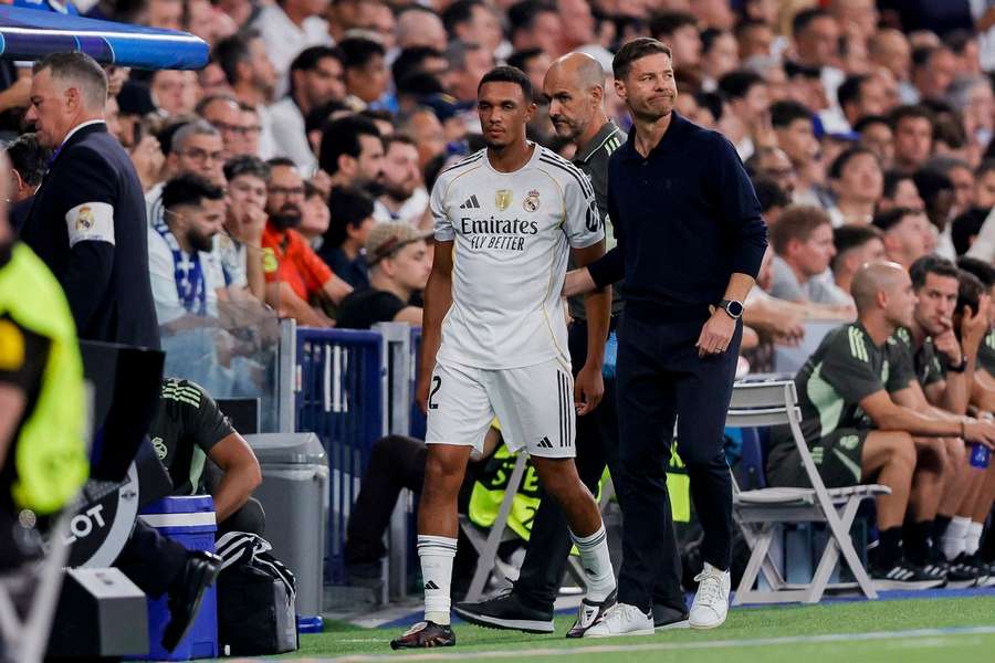 Trent Alexander-Arnold injured three minutes into Madrid clash Trent Alexander-Arnold injured three minutes into Madrid clash