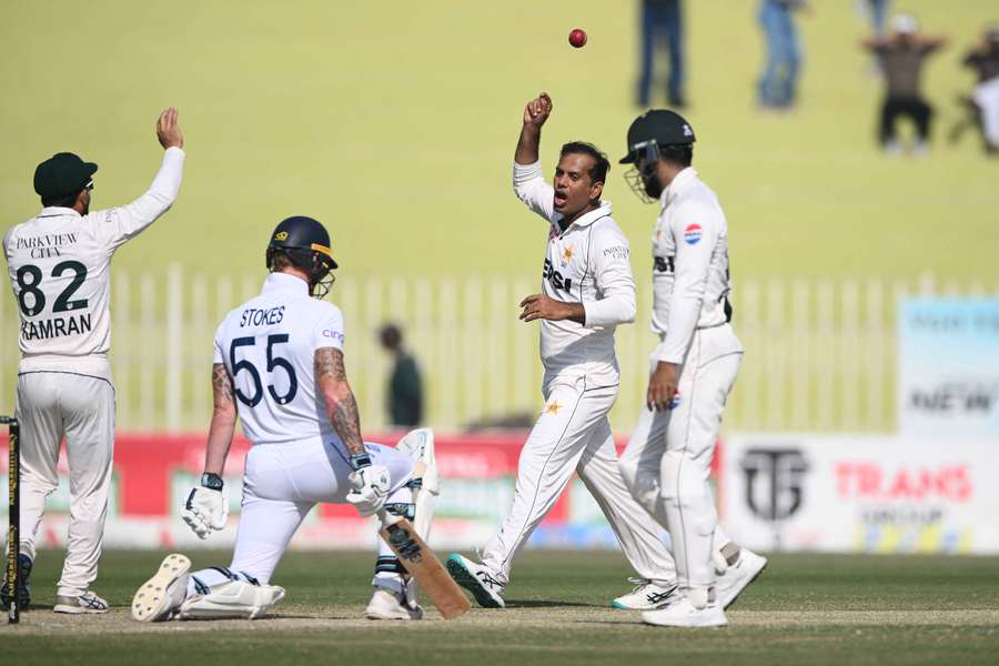 Pakistan bowler Nouman Ali celebrates after taking the wicket of England batsman Ben Stokes