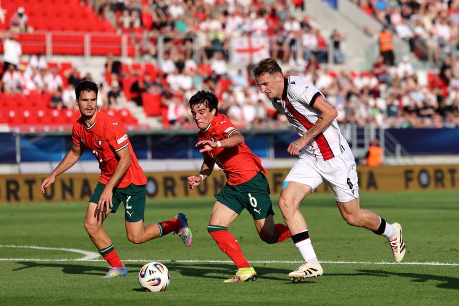 Diogo Nascimento of Portugal competes for the ball with Nodar Lominadze of Georgia