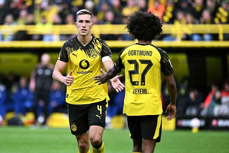 Nico Schlotterbeck, alături de Karim Adeyemi