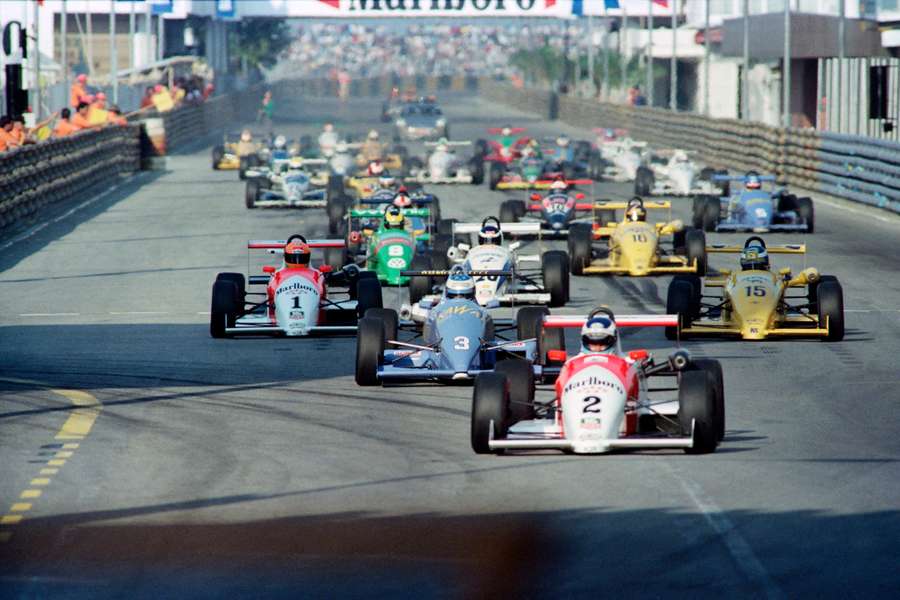 Future Formula 1 greats Michael Schumacher and Finish driver Mika Hakkinen compete in the F3 Macau Grand Prix in 1990