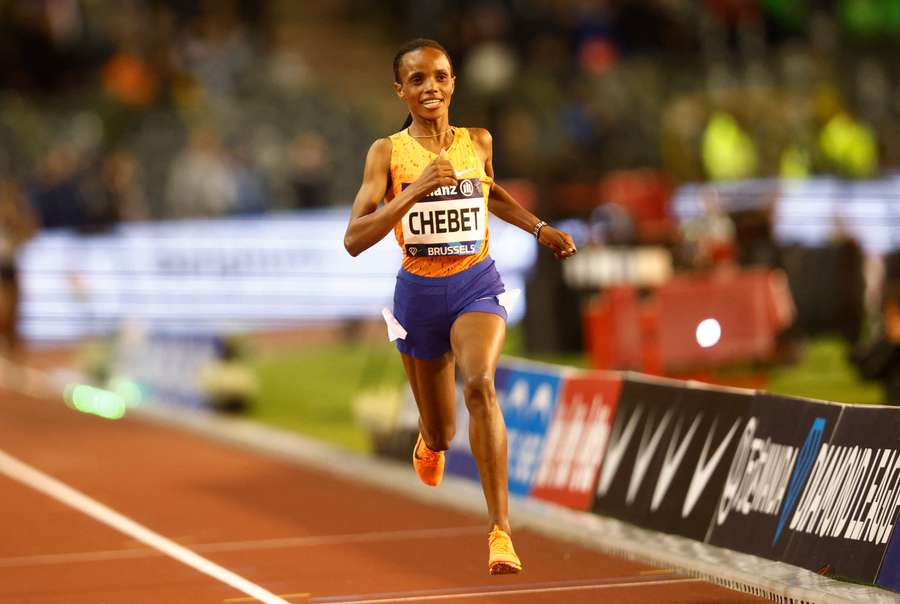 Beatrice Chebet of Kenya crosses the finish line to win the Women's 5,000m final