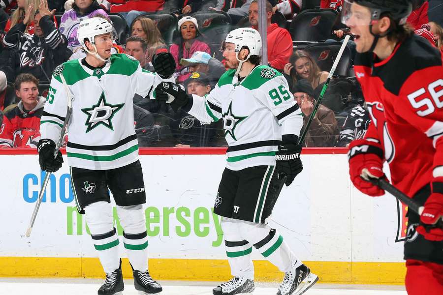Matt Duchene (centre) celebrates his goal for Dallas