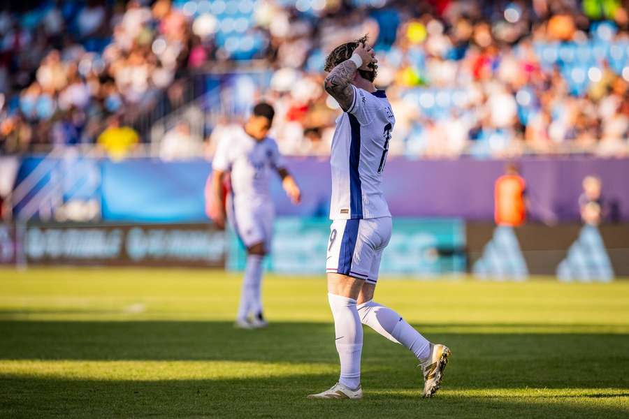 Harvey Elliott reacts to an England missed chance