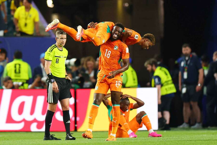 Amad Diallo is carried off by Ibrahim Sangare after he scored the winner for Ivory Coast Amad Diallo is carried off by Ibrahim Sangare after he scored the winner for Ivory Coast