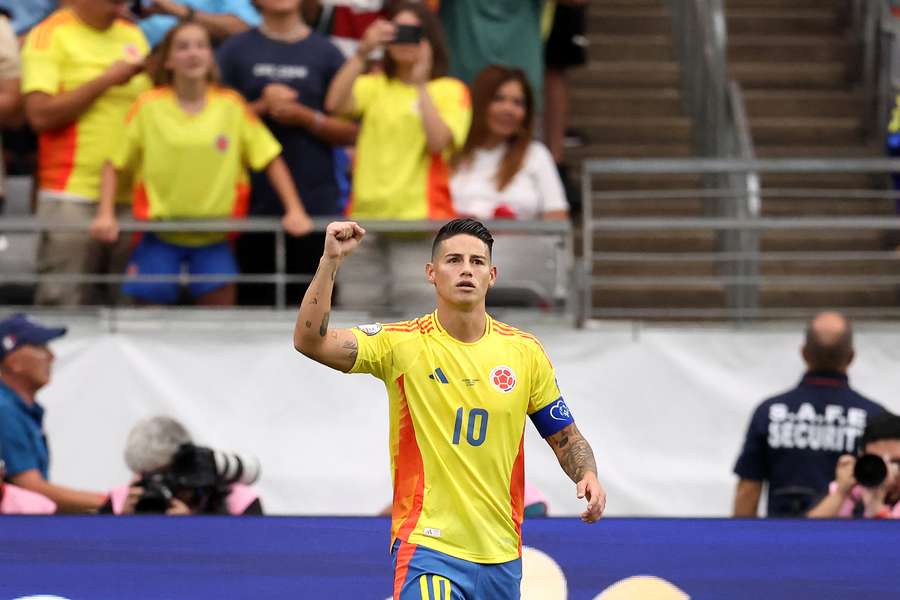 James Rodriguez celebrates after converting penalty