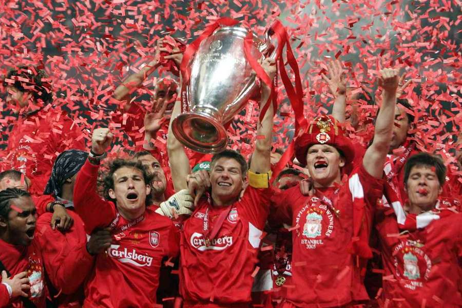 Liverpool captain Steven Gerrard lifts the UEFA Champions League trophy after beating AC Milan in the 2005 final