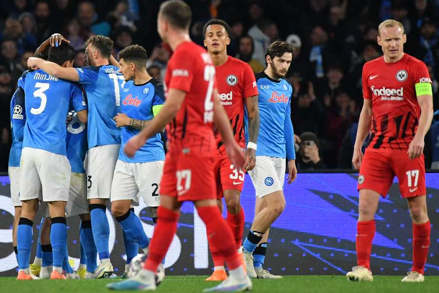 Napoli's players celebrate during their defeat of Frankfurt