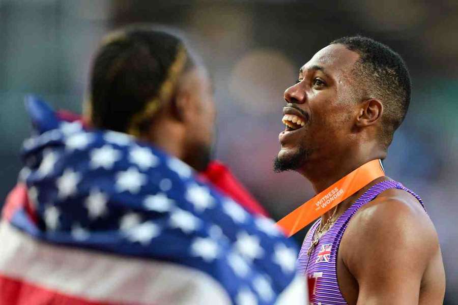 Zharnel Hughes beams in delight after clinching bronze in the 100m final
