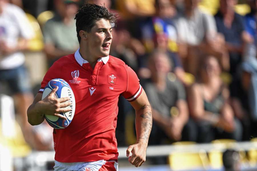 Wales' wing Louis Rees-Zammit runs to score a try during the France 2023 Rugby World Cup Pool C match between Wales and Georgia 