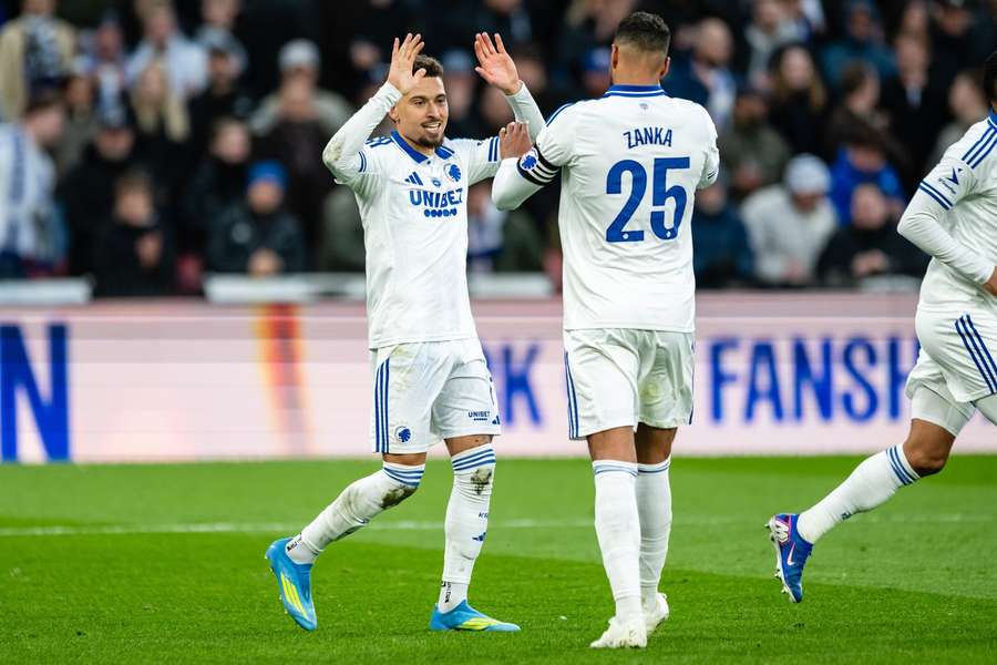 FC Copenhagen's Jordan Larsson and Mathias "Zanka" Jorgensen celebrate the win against OB