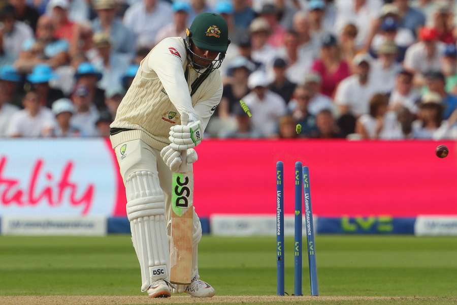 Australia's Usman Khawaja is bowled by England's Stuart Broad off a no-ball
