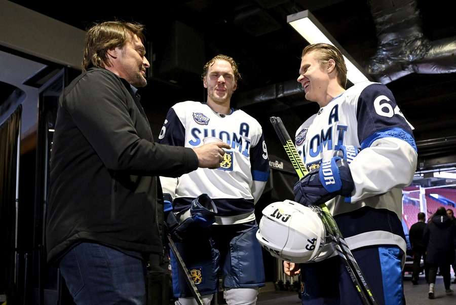 Teemu Selänne (L) and Mikko Rantanen and Mikael Granlund of Finland during the media day