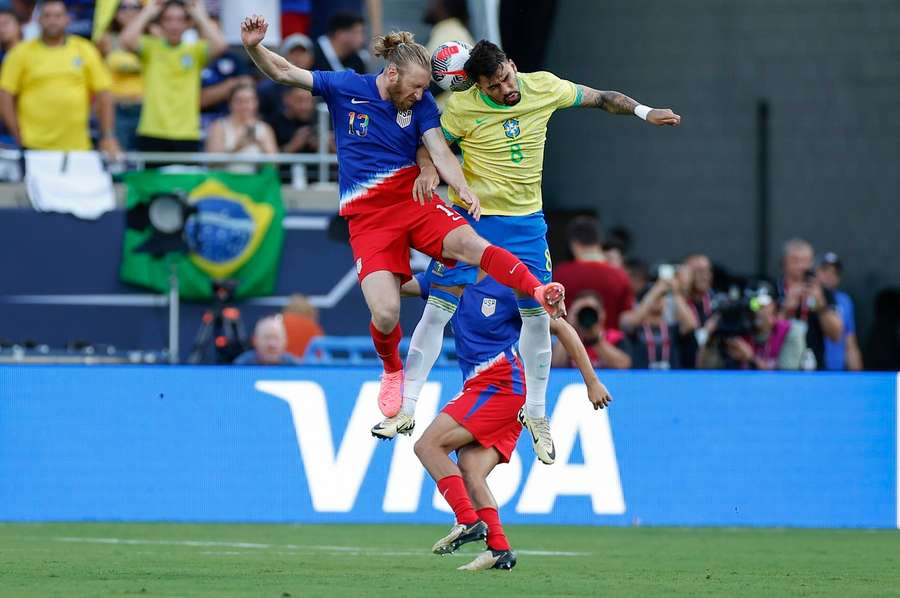Tim Ream of the USA battles for the ball with Brazil's Lucas Paquetá