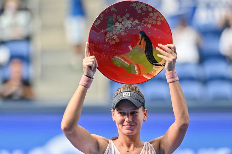 Kudermetova poses with the trophy