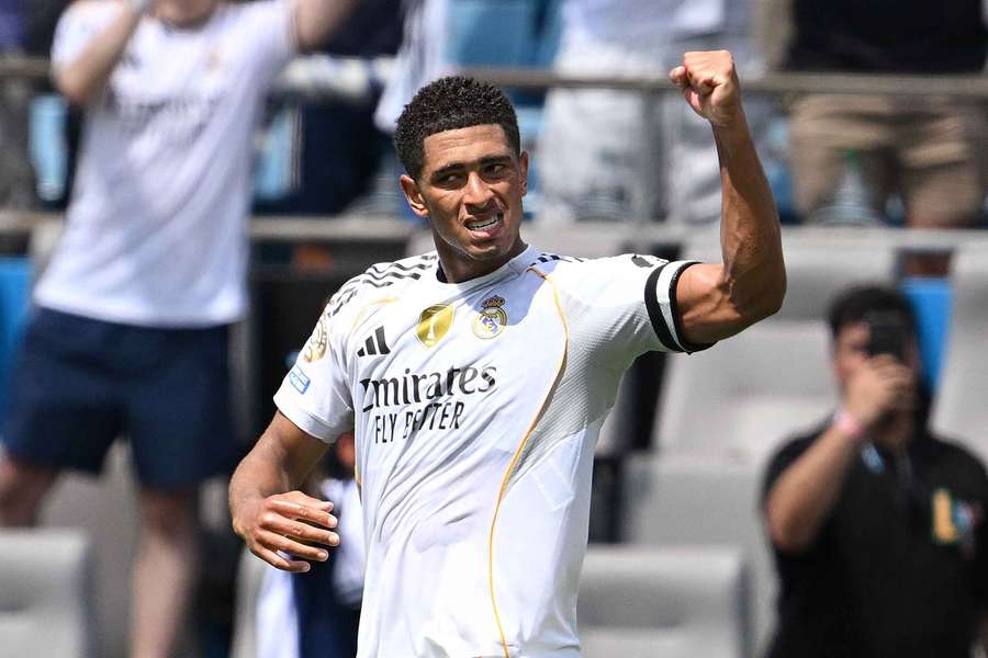 Real Madrid's English midfielder #05 Jude Bellingham celebrates after scoring the opening goal 