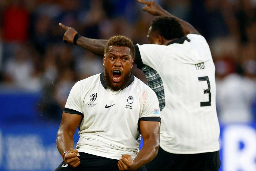 Fiji's Tevita Ikanivere celebrates at the end of the match