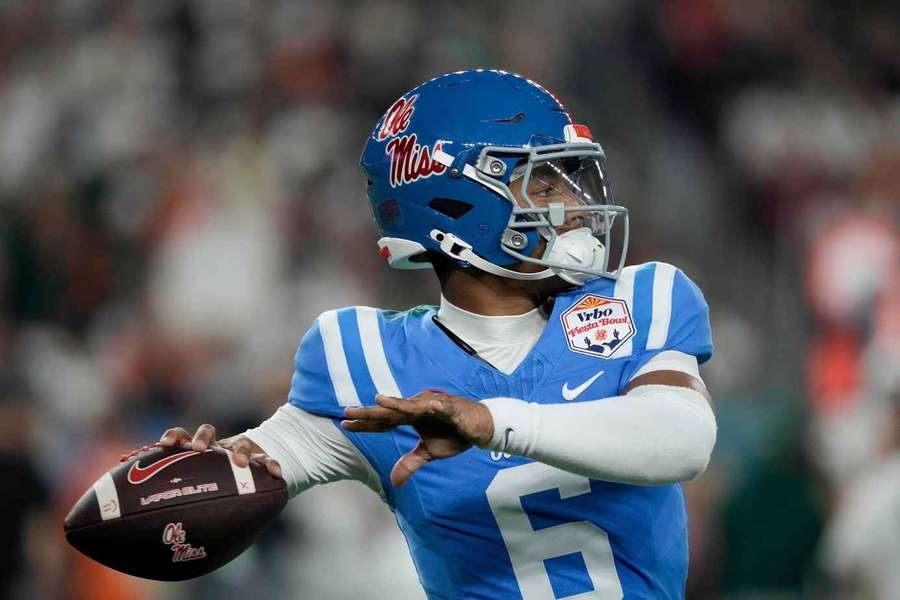 Quarterback Trinidad Chambliss throws a pass in the CFP against the Miami Hurricanes 