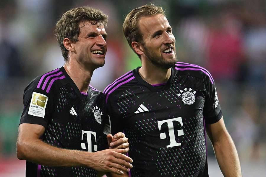 Kane with Bayern hero and teammate Thomas Muller 