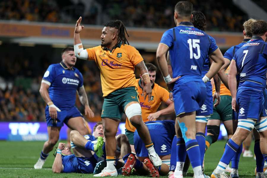 Australia's Brandon Paenga-Amosa celebrates a try against Italy. Australia's Brandon Paenga-Amosa celebrates a try against Italy.