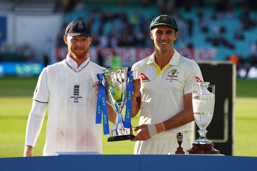England and Australia's captains pose for the media following the final Ashes test at The Oval
