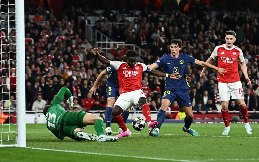 Arsenal's Bukayo Saka scores their first goal past Atletico Madrid's Jan Oblak