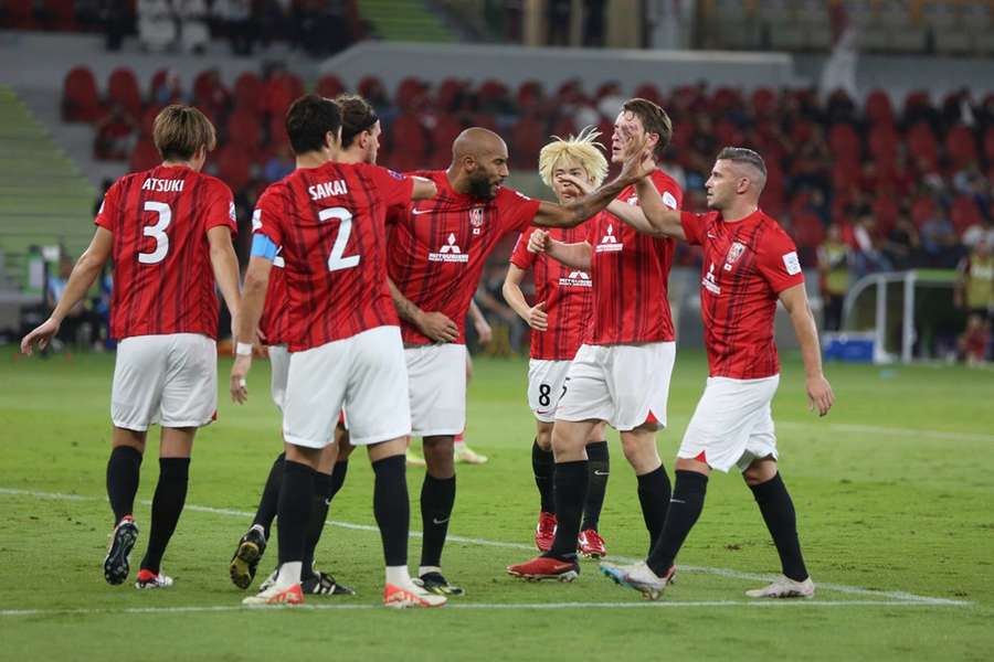 Spelers van Urawa vieren een doelpunt, maar verloren uiteindelijk