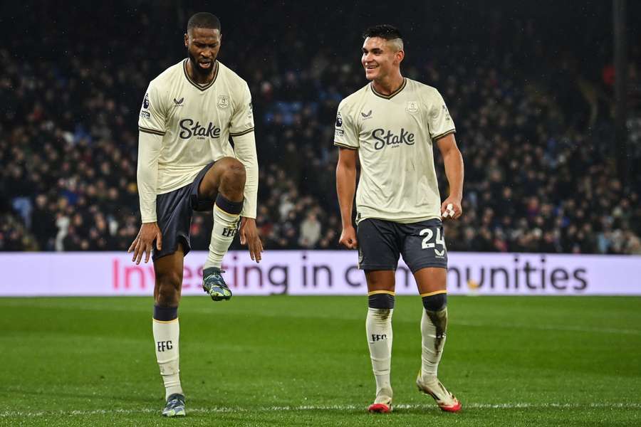 Everton's Portuguese striker #14 Beto (L) celebrates with Everton's Argentinian midfielder #24 Charly Alcaraz after scoring his team's first goal