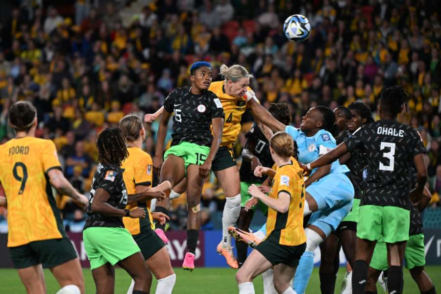 Australia's Alanna Kennedy in action with Nigeria's Rasheedat Ajibade and Chiamaka Nnadozie