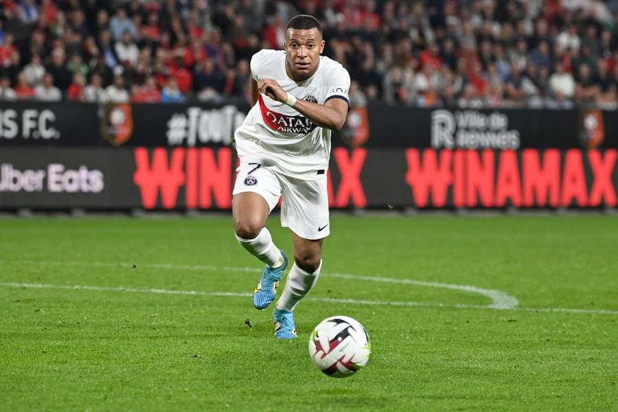 Paris Saint-Germain's French forward #07 Kylian Mbappe runs for the ball Paris Saint-Germain's French forward #07 Kylian Mbappe runs for the ball