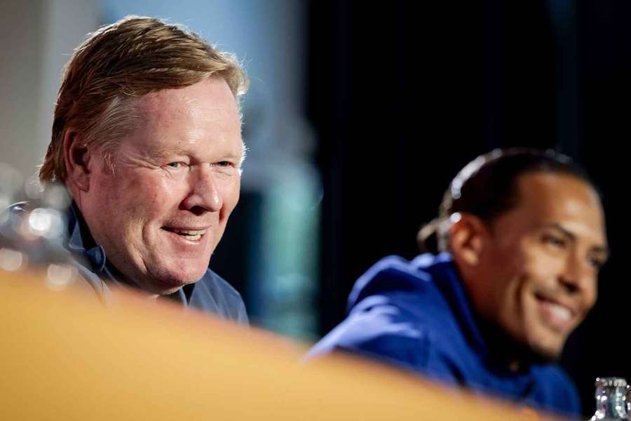 Ronald Koeman and Virgil van Dijk smile during Monday's press conference in Zeist