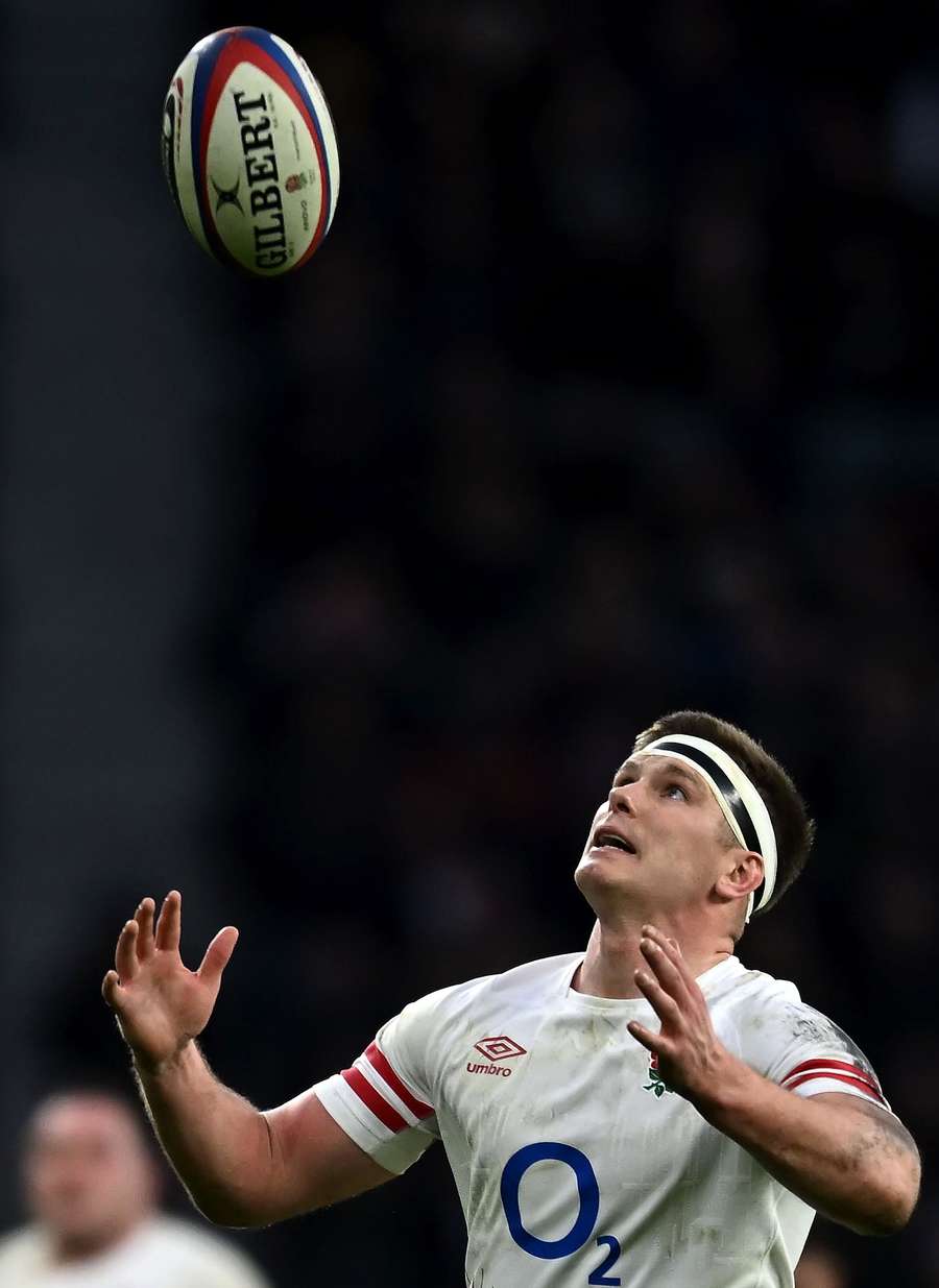 England's fly-half Owen Farrell catches the ball during the Six Nations international rugby union match between England and Italy