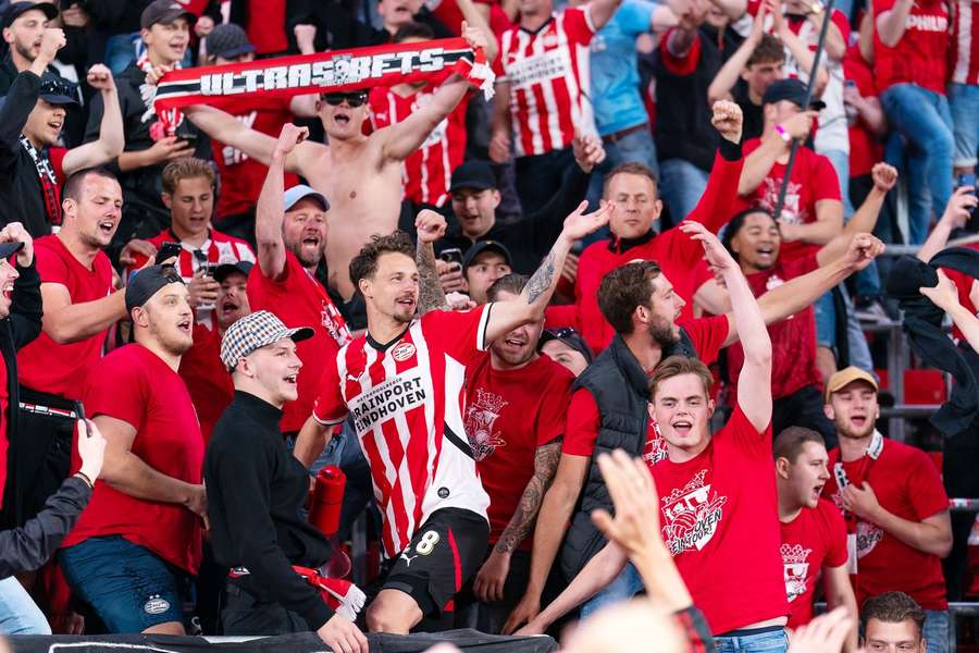 PSV defender Olivier Boscagli and fans celebrates taking over the top spot after the match against Heracles Almelo PSV defender Olivier Boscagli and fans celebrates taking over the top spot after the match against Heracles Almelo