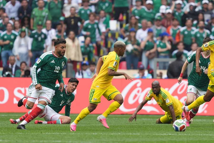 South Africa slumped to a disappointing 2-0 defeat with nine men South Africa slumped to a disappointing 2-0 defeat with nine men
